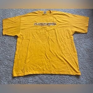 (Gildan’) yellow t-shirt.